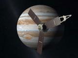 Слика 1: Сондата Џуно во орбита околу Јупитер (уметничка визија).
