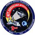 Амблемот на мисијата STS-82 за поправка на Хабл