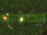 Oптичка слика на галаксијата од којашто потекнува хидроксилниот мегамасер